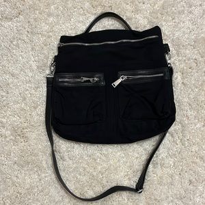 Colab nylon purse. Adjustable crossbody, multiple outside and inside pockets.